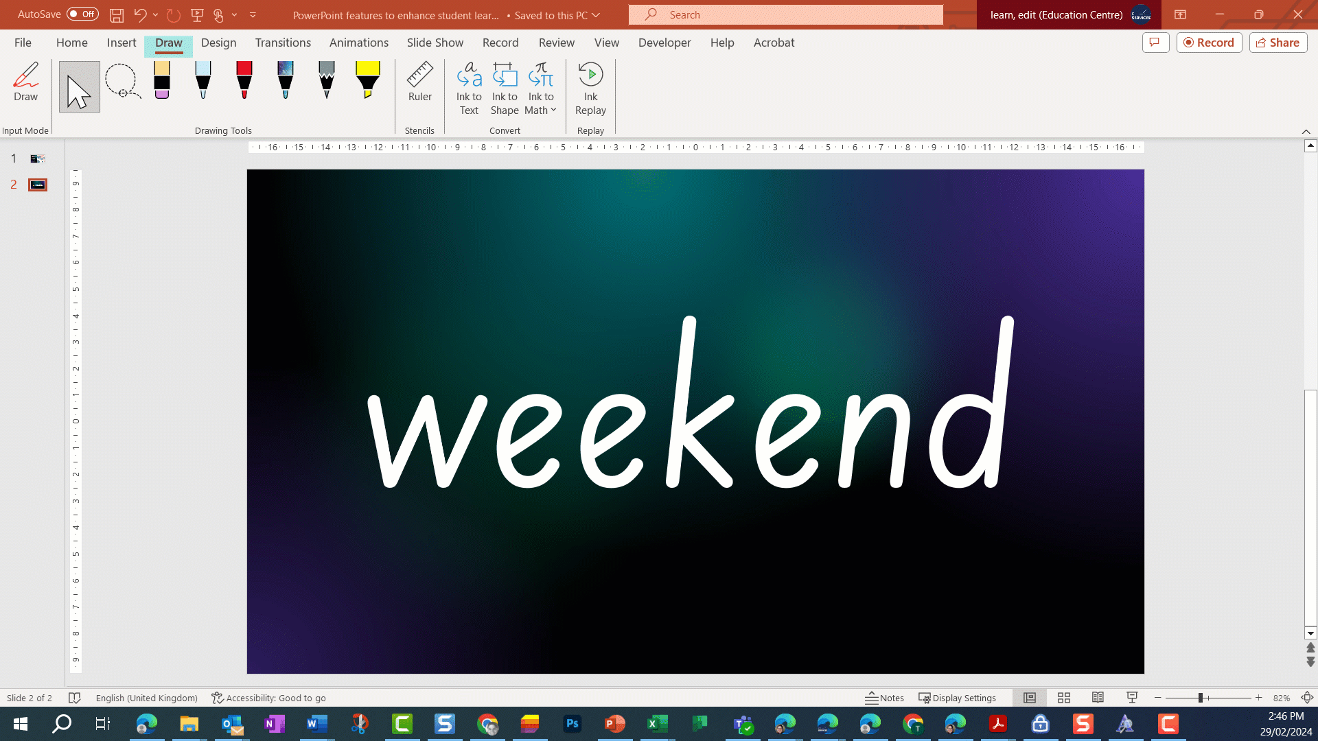 PowerPoint slide showing the word weekend. Using a pencil tool from the draw menu, the different sounds in the word are underlined and the word is split into syllables. 